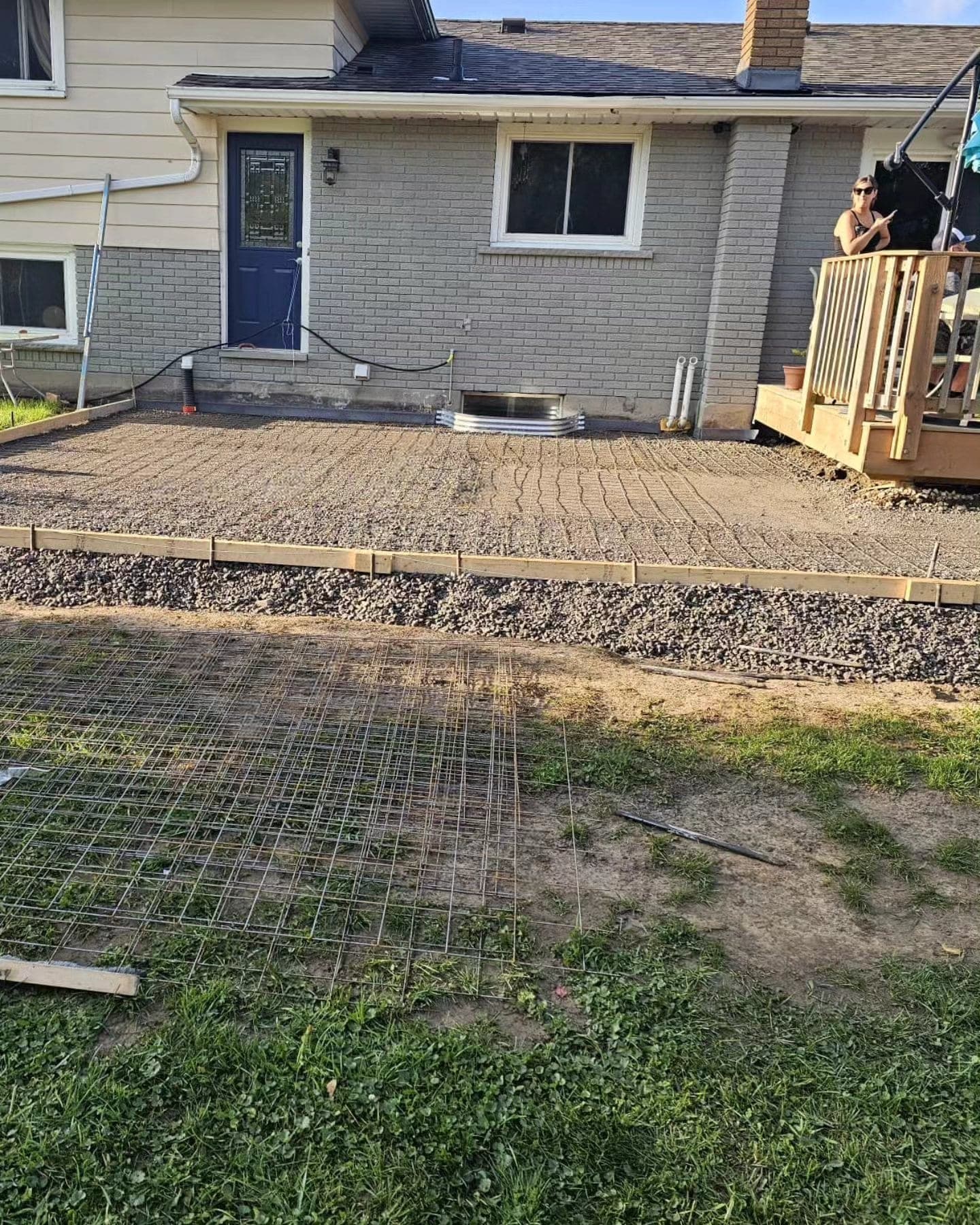 Concrete pad preparation with rebar grid